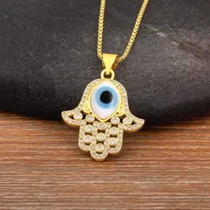 Exquisite gold-plated Hamsa hand evil eye necklace detail, micro-pave cubic zirconia pendant charm.
