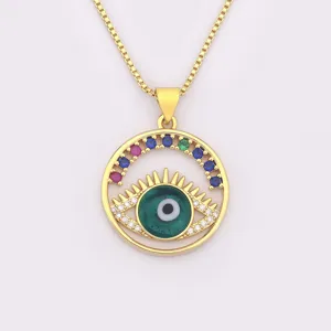 Stupenda collana con ciondolo malocchio placcato oro con pietre zirconi colorati luminosi.