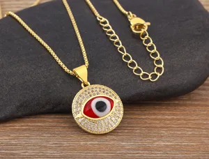 Gold plated micro-pave cubic zirconia evil eye pendant necklace detail shot, elegant jewelry.
