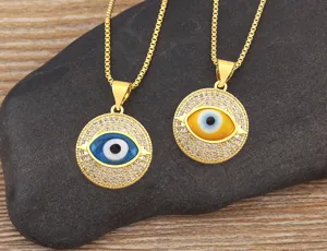 18k gold plated evil eye pendant necklace set with sparkling cubic zirconia stones detailed.