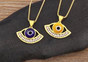Gold plated evil eye zircon necklace geometric turkish blue eye pendant jewelry detail shot.