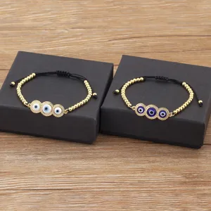 Bracelet de perles œil turc plaqué or avec zircone micro-serti et cordon réglable.