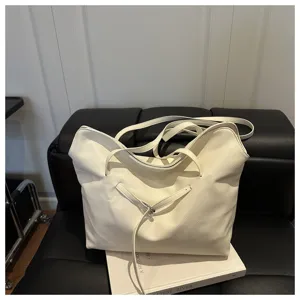 Minimalist solid color slouchy tote bag for women, casual PU leather single shoulder bag.