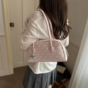 Stylish pink polka dot shoulder bag for women, trendy large capacity daily tote purse.