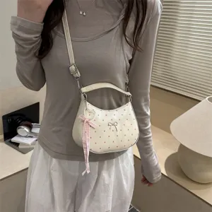 Chic polka dot crescent shoulder bag for women, stylish commuting handbag with bow