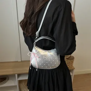 Chic silver metallic polka dot hobo shoulder bag with cute bow charm for women summer.