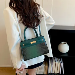 Dark green crocodile pattern chic shoulder bag, stylish top handle commuting tote for women.