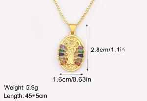 Gold plated grim reaper pendant necklace with colorful cubic zirconia stones detailed view.