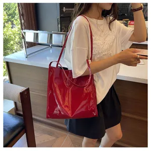 Red patent leather shoulder tote bag for women, large capacity casual commuter handbag.