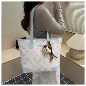 Large capacity women tote shoulder bag, stylish casual commute handbag with cute bear pendant.