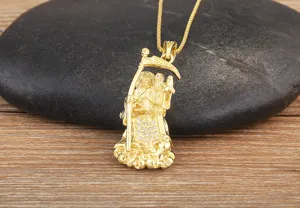 Gold plated Grim Reaper pendant necklace with scythe and owl design, vintage gothic jewelry.