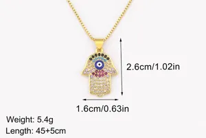 Gold plated Hamsa hand necklace with colorful cubic zirconia and evil eye detail.
