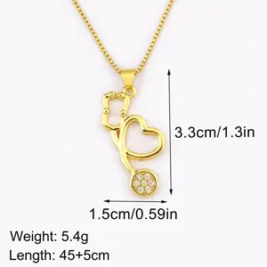 Gold plated stethoscope heart pendant necklace with shimmering cubic zirconia stones for daily wear.