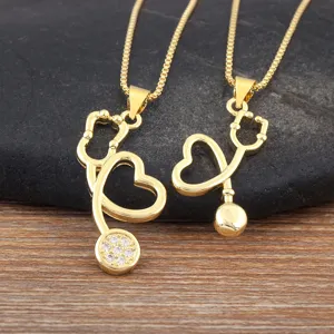 Gold stethoscope heart pendant necklace stylish medical jewelry for women and men daily wear.