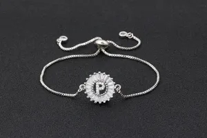 Adjustable initial letter P bracelet featuring sparkling round cubic zirconia pendant.