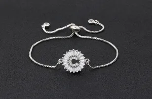 Detailed view of the adjustable silver chain bracelet featuring a sparkly cubic zirconia letter C.