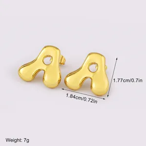 Gold puffy letter A stud earrings for women and men, minimalist shiny metal geometric jewelry.