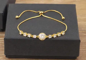 Pulsera deslizante de cobre bañado en oro de 18K con circonitas brillantes, ajustable.
