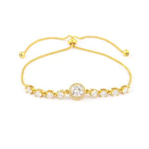Elegante pulsera ajustable chapada en oro de 18k con brillantes piedras de circonita para mujer.