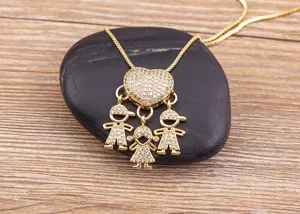 Gold-plated rhinestone heart necklace with three lovely children charms for family love.