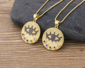 Detailed view of the gold-plated Turkish evil eye pendant necklace with colorful zircon stones.