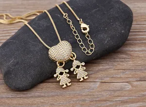 18K gold plated heart and two little girls pendant necklace with cubic zirconia gemstones.