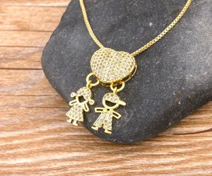 Gold plated cubic zirconia heart necklace with cute boy and girl family pendant for women.