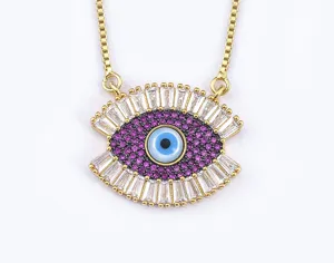 Turkish evil eye necklace with pink zircon and baguette-cut stones in gold plated finish.