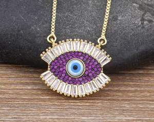 Close-up detail of the evil eye pendant necklace featuring sparkling cubic zirconia stones.