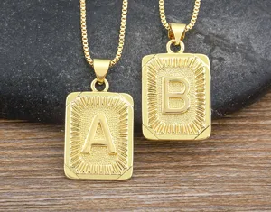 Gold initial letter pendant necklace with square design for stylish hip-hop look.