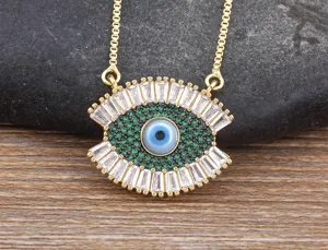Close-up detail of the gold evil eye pendant necklace with sparkling micro-pave cubic zirconia.