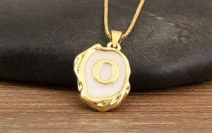 Gold-plated initial letter O pendant necklace with irregular geometric design for women fashion.