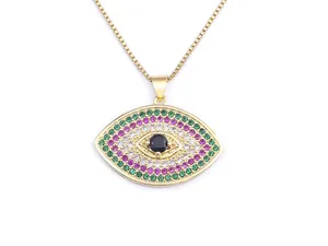 Gold-plated evil eye pendant necklace with colorful cubic zirconia stones and fine details.