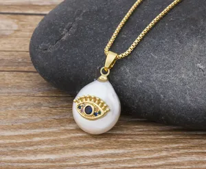 Gold box chain necklace with baroque pearl evil eye pendant, stylish blue zircon jewelry.