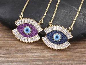 Detailed view of Turkish evil eye pendant necklaces with sparkling cubic zirconia crystals.