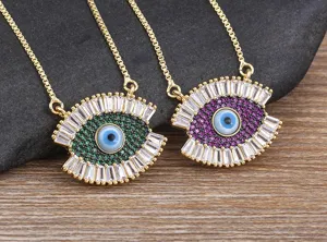 Close up detail of exquisite evil eye pendant necklace with colorful cubic zirconia stones.