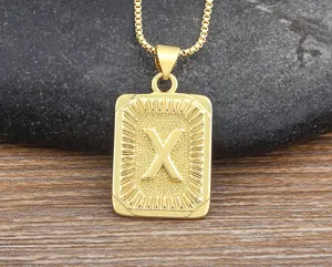 Gold letter X pendant necklace, hip hop style jewelry for men, shinning metallic accessory.
