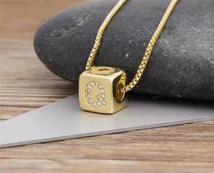 Gold plated cubic zirconia initial letter Q cube pendant necklace for women daily wear.