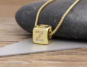 Close-up detail view of the gold-plated cubic Z letter pendant necklace showcasing delicate zircon.