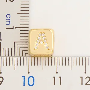 Gold plated cubic letter A pendant necklace with sparkling micro paved cubic zirconia stones.