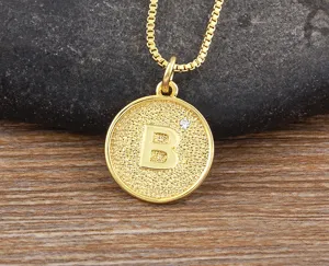 Minimalist 18k gold plated round letter B pendant necklace with sparkling zircon detail.