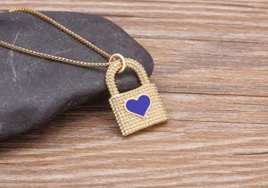 Collier pendentif cadenas cœur plaqué or avec goutte émail bleu, élégant bijou vintage.
