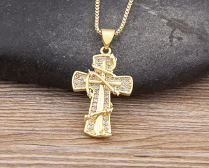 Gold cross pendant necklace with sparkling cubic zirconia, perfect stylish jewelry for women.