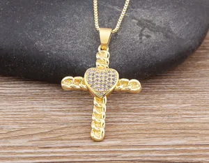 Exquisite 18K gold plated cross pendant necklace featuring sparkling paved cubic zirconia heart.