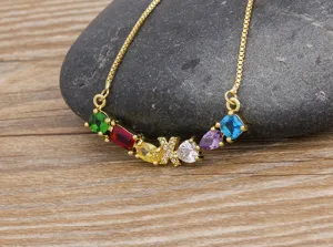 Gold plated brass multi-color cubic zirconia letter X pendant clavicle chain necklace.
