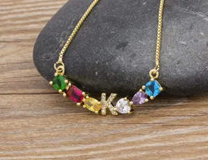 Gold plated necklace with colorful zirconia stones and initial letter K pendant for women.