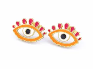 Close-up detail of trendy evil eye stud earrings with vibrant colorful enamel and gold finish.