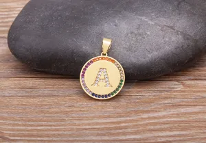 Detailed view of gold-plated initial letter A pendant with colorful micro-paved zirconia.