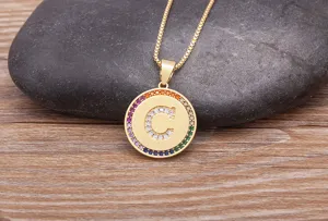 Gold-colored letter C pendant necklace featuring sparkling colorful cubic zirconia stones.