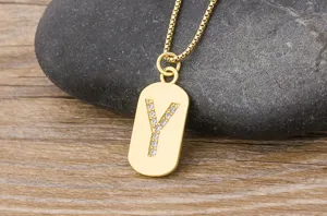 Gold 18k plated initial letter Y pendant necklace featuring sparkling cubic zirconia stones.